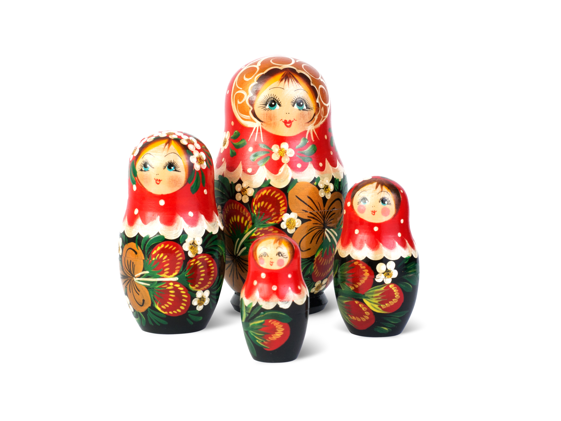 Four different sized babushka dolls in a formation